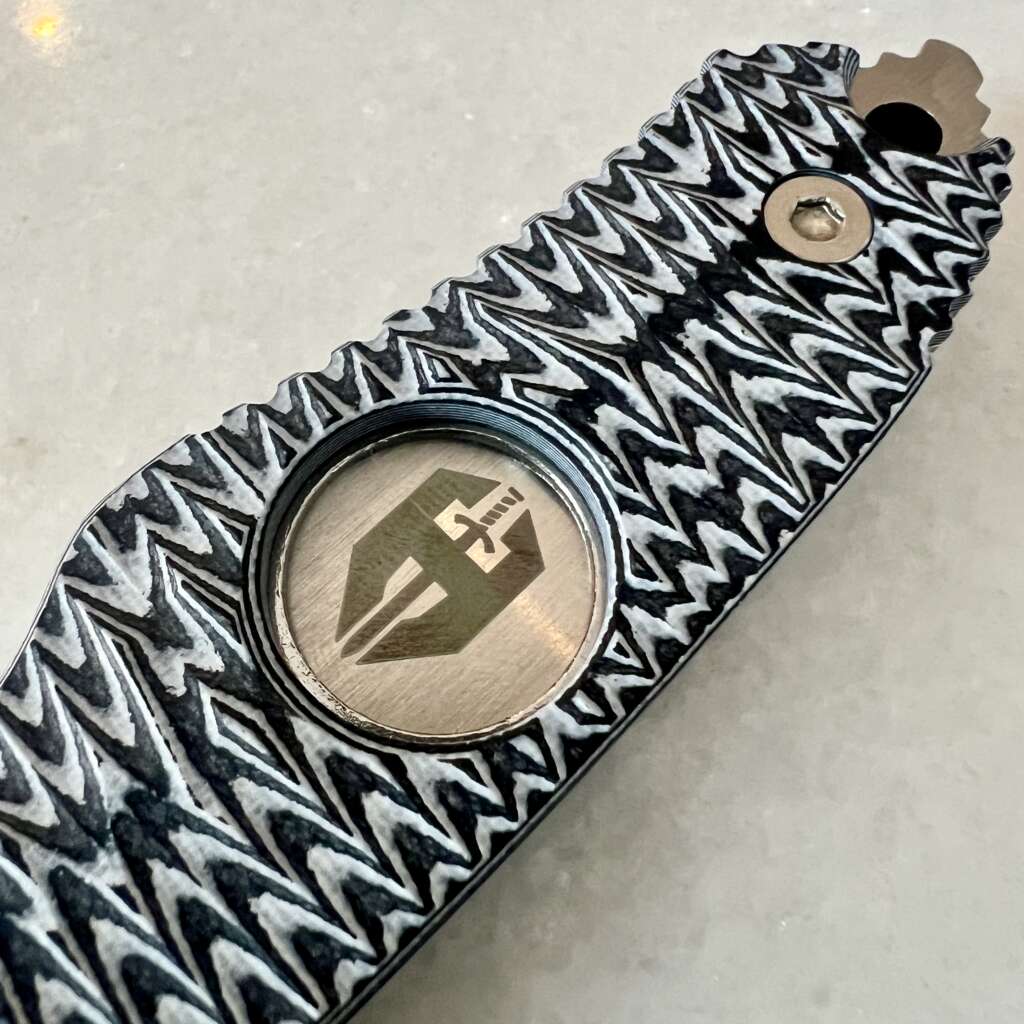 Hoffner knife handle with Index Divot reference points for tactical grip control
